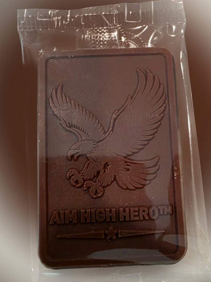 Wrapped Aim High Hero chocolate bar embossed with a flying eagle