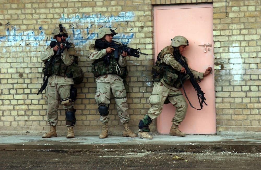 U.S. Army soldiers preparing to enter a building in Fallujah, Iraq, in 2004; not David Bellavia's unit